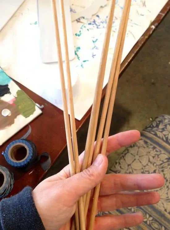 Holding six dowel rods in my hand