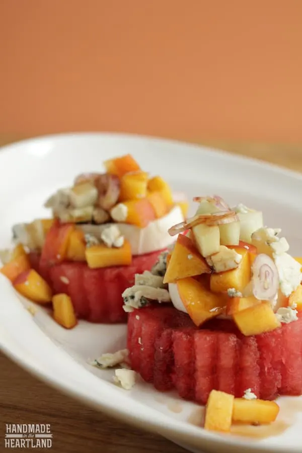 This watermelon salad recipe is full of flavor! The peaches and cucumber give it sweetness and crunch; and the cheese and shallots are a perfect addition.