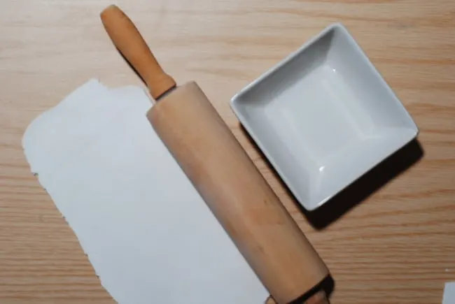 rolling out air dry clay with a rolling pin