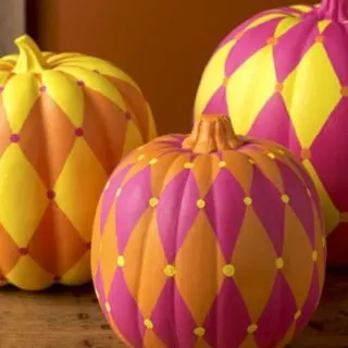 These awesome harlequin DIY pumpkins are so easy to make - the perfect last minute idea for your holiday decor.