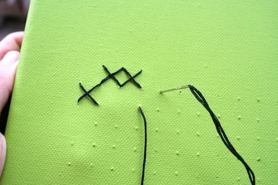 Creating Xs on a canvas with thread and a needle