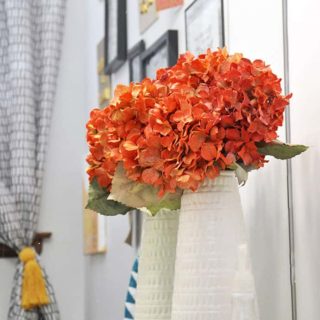 If you can't find fake flowers in the colors you need or just want a change, paint them! Here's how.