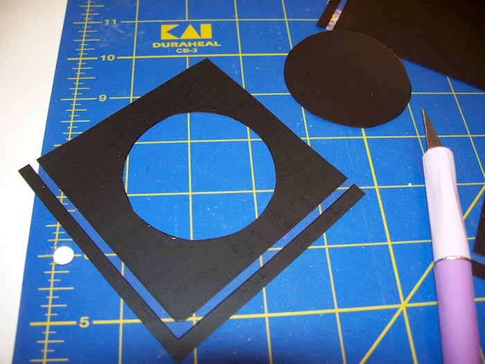 Cutting a circle stencil out of an adhesive stencil sheet