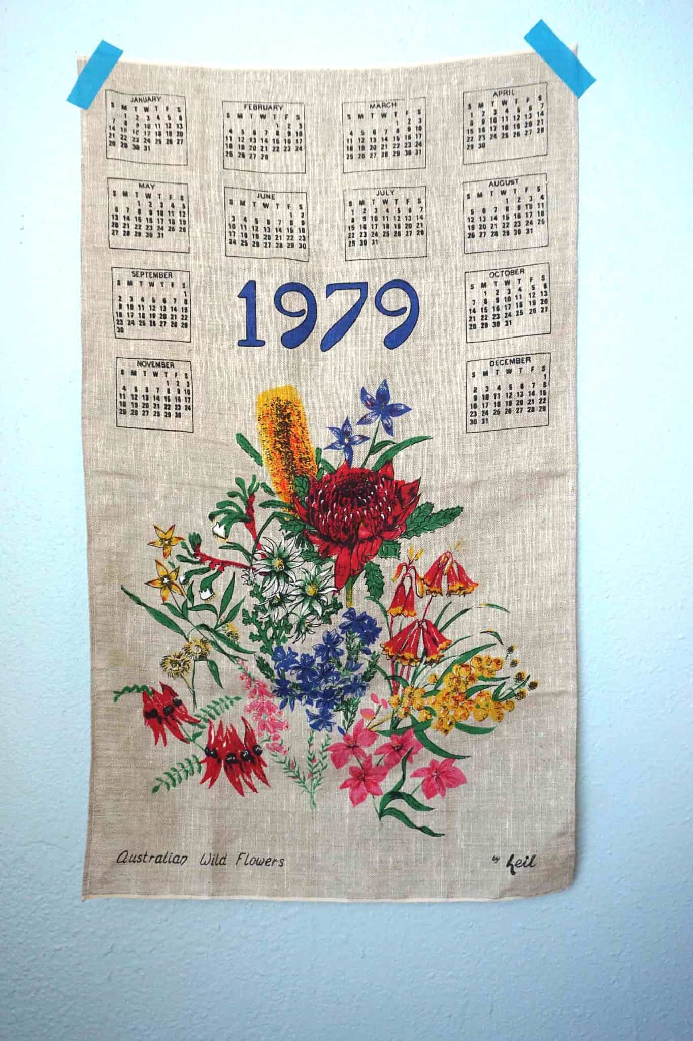 Vintage Tea towel taped to the wall