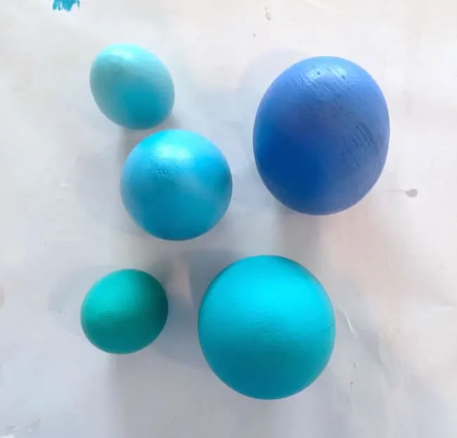 Blue painted wood Easter eggs