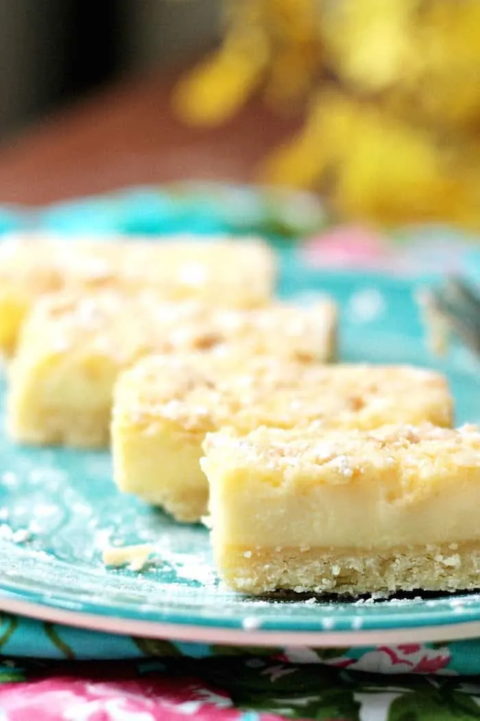 Lemon bars made from scratch on a plate