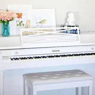 This DIY piano makeover was a dream come true! See how we gave this use piece a new life with some paint and new hardware.