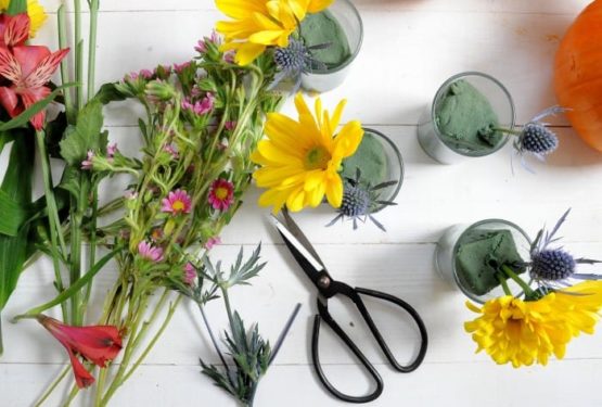 Cutting flowers to put into the floral foam
