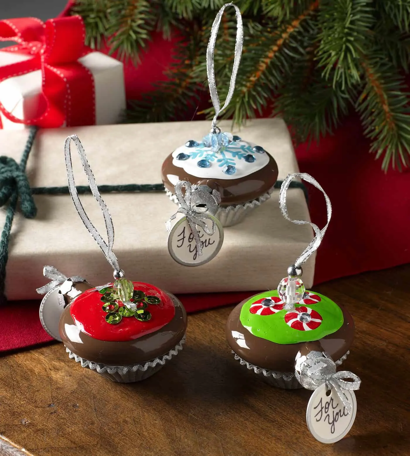 These handmade Christmas ornaments are regular ornaments painted to look just like cupcakes! Have you ever seen anything so sweet?