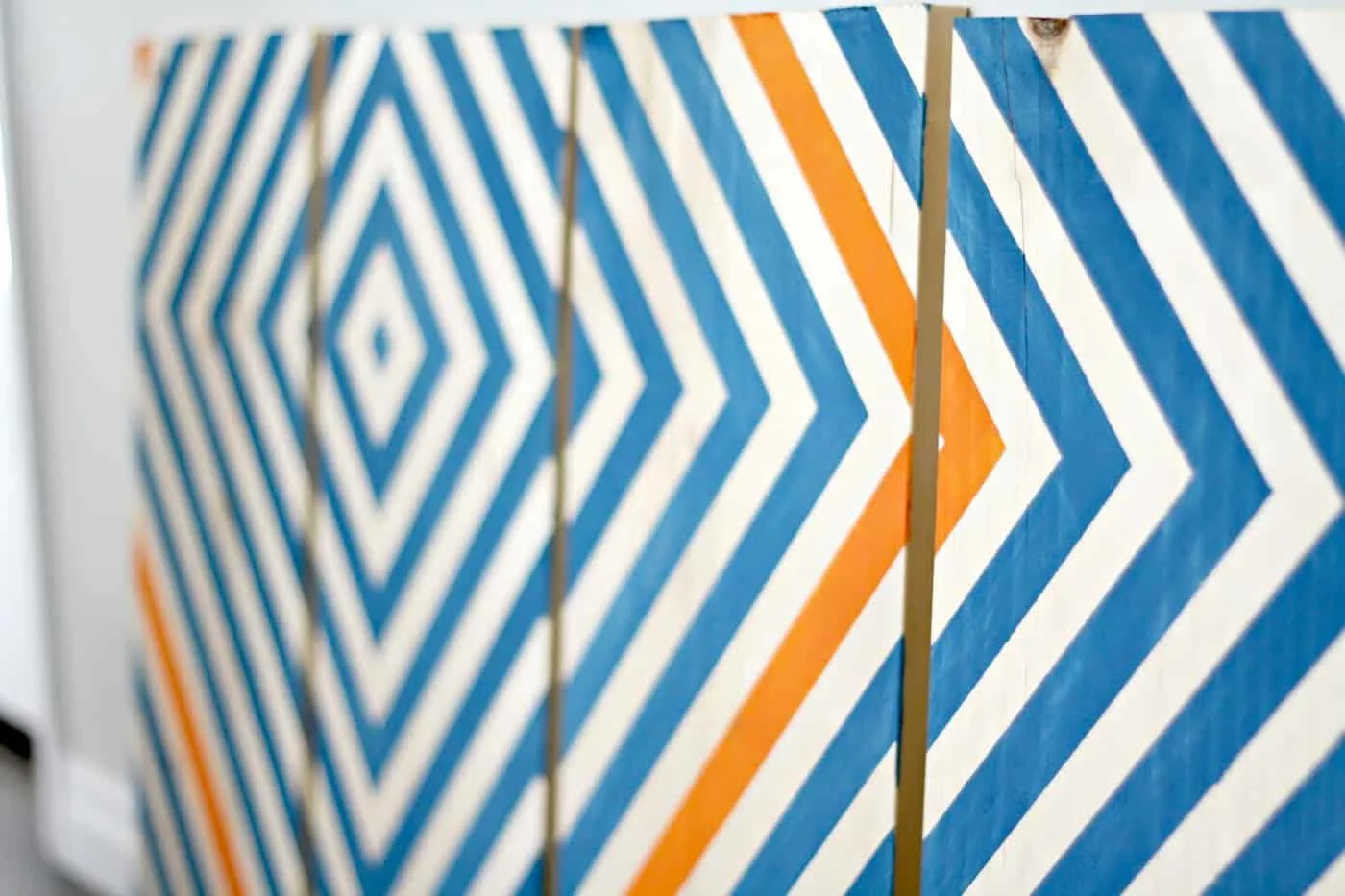 diy wood art with a geometric painted design