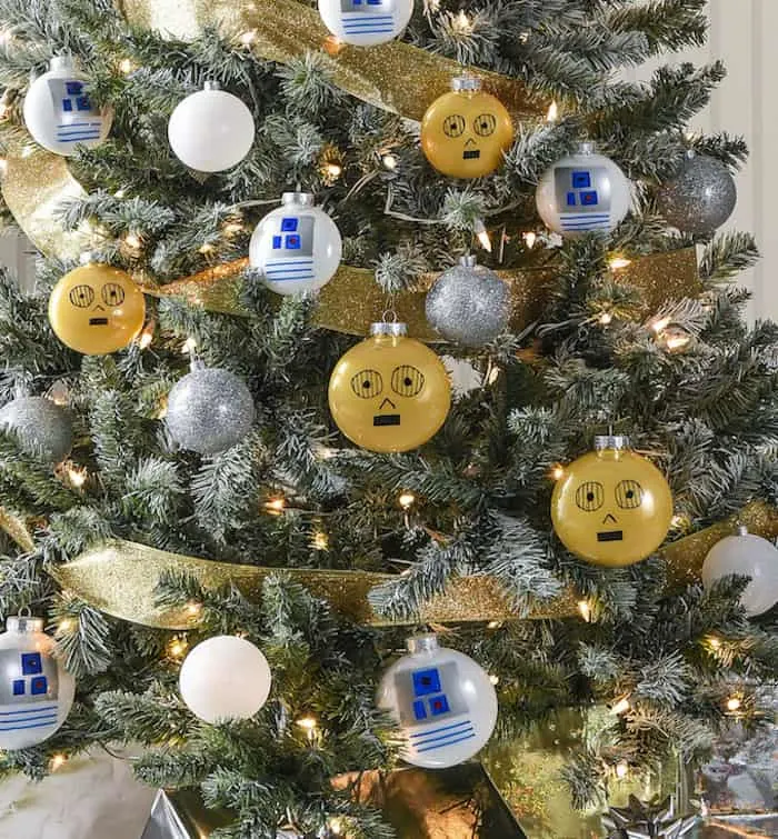 Rebels will love this droid themed Star Wars Christmas tree! Learn how to easily make your own C-3PO and R2-D2 ornaments.