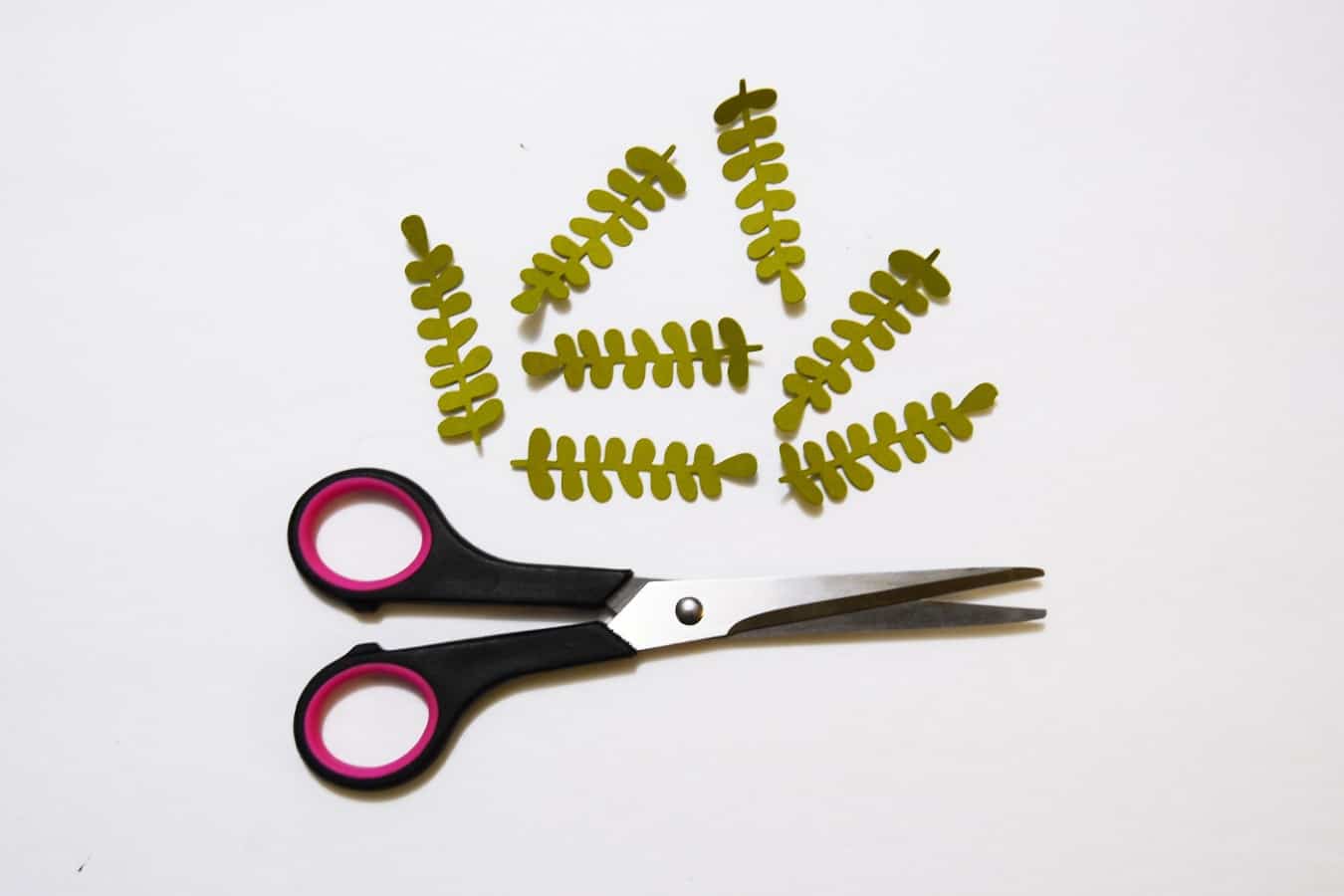 Cut out leaves and a pair of scissors