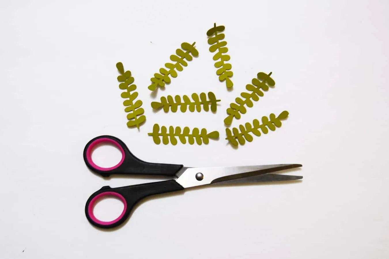 Cut out leaves and a pair of scissors