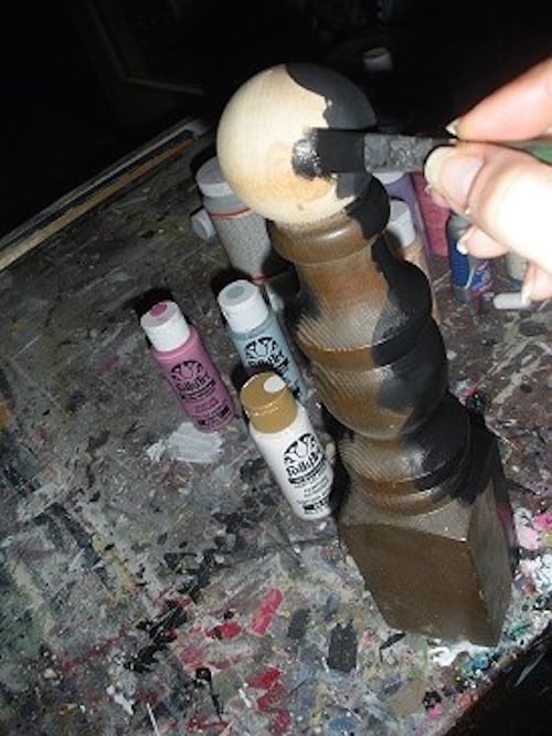 painting a spindle with black craft paint