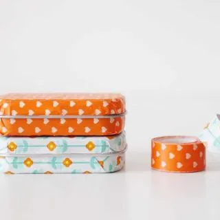 If you love washi tape crafts, grab your favorite pattern, a used mint tin, and turn into a cute little holder! This is such a fun and easy upcycled craft!