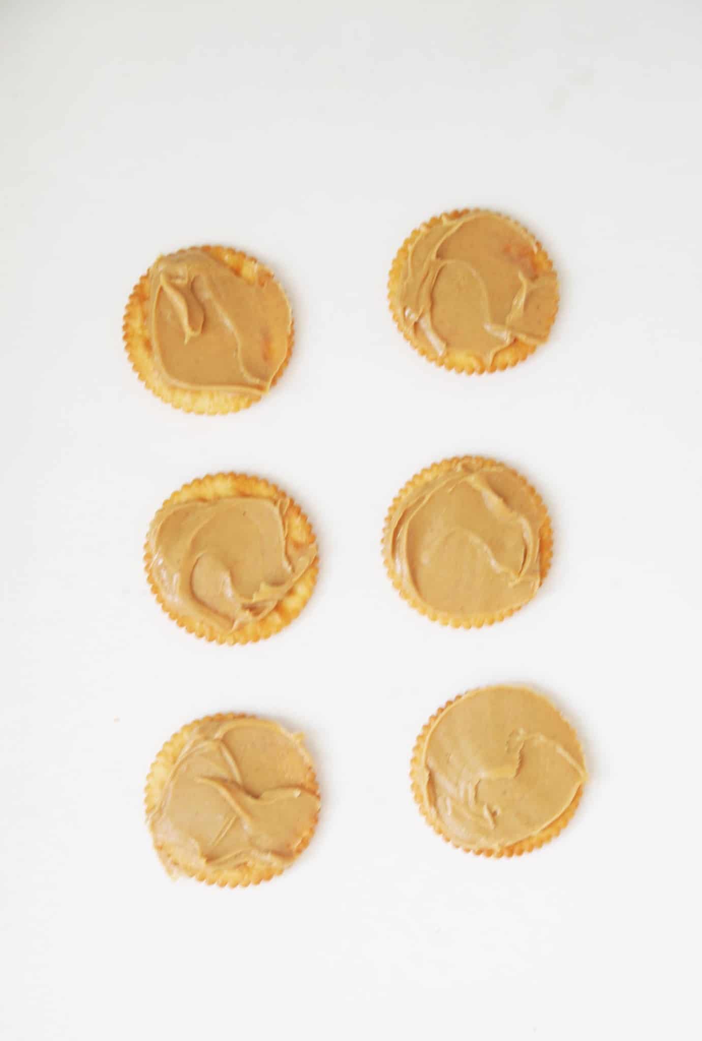 Peanut butter on top of crackers