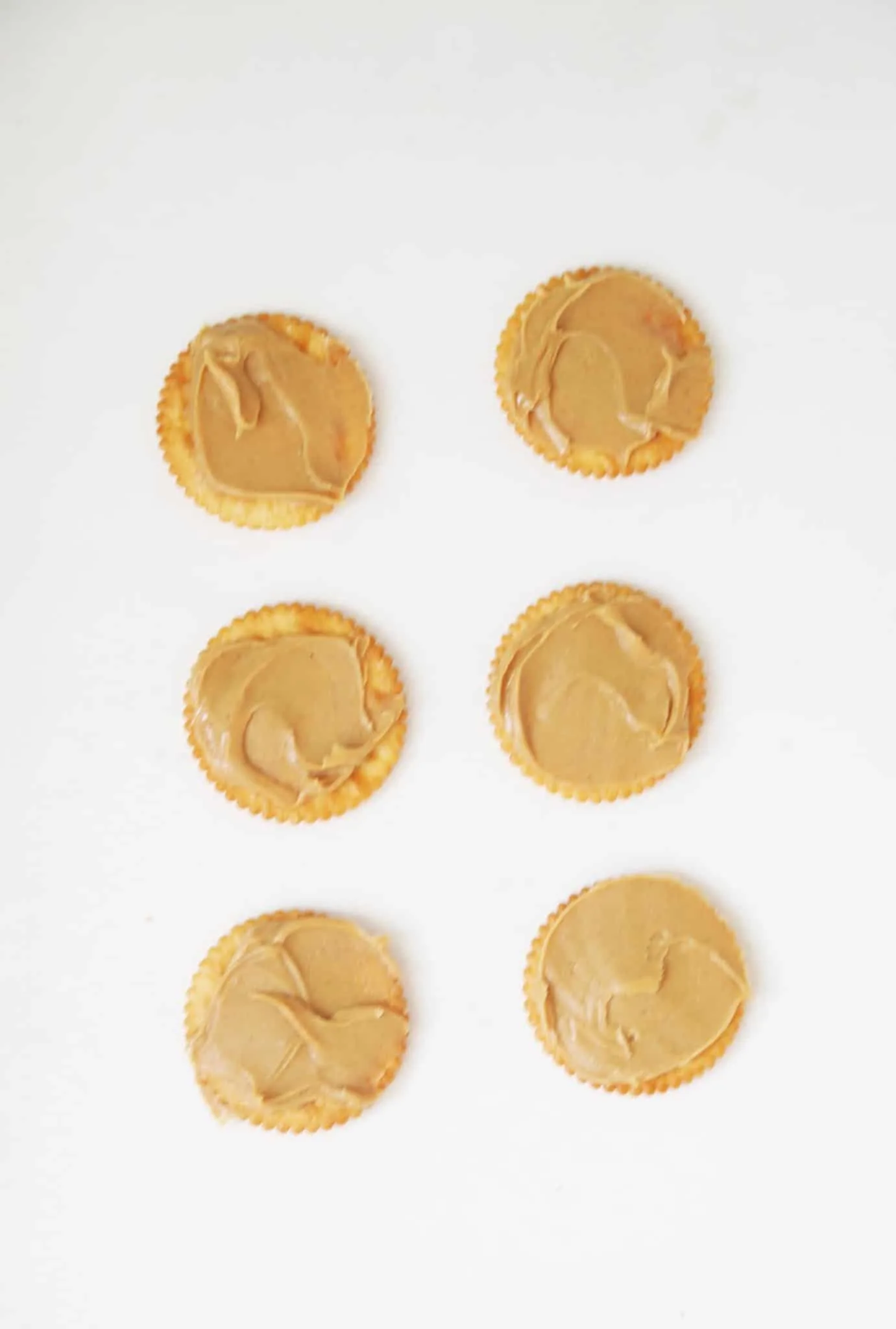 Peanut butter on top of crackers