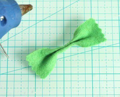 Rectangular piece of felt hot glued in the center