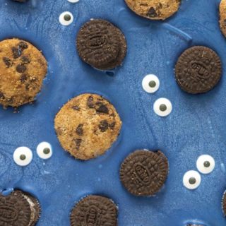 Chocolate chip cookies, Mini Oreos, and candy eyeballs in blue candy melts