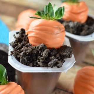 Dirt pudding cups for Easter with strawberry carrots