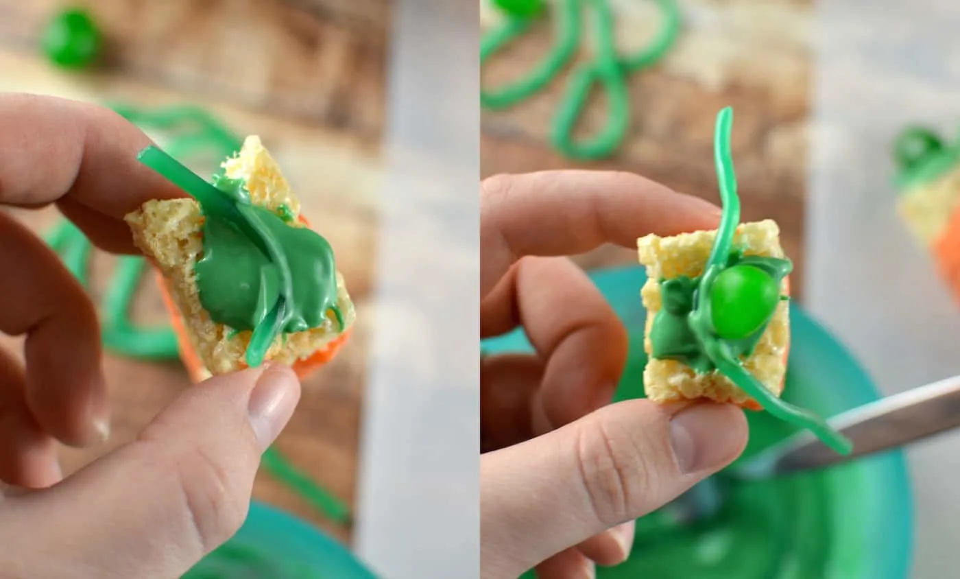 Adding the green carrot top with candy melts