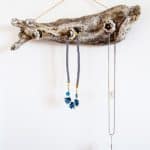 Use a gorgeous driftwood piece to create a unique jewelry hanger. It looks great on the wall whether you have jewelry on it or not, and it's easy to make!