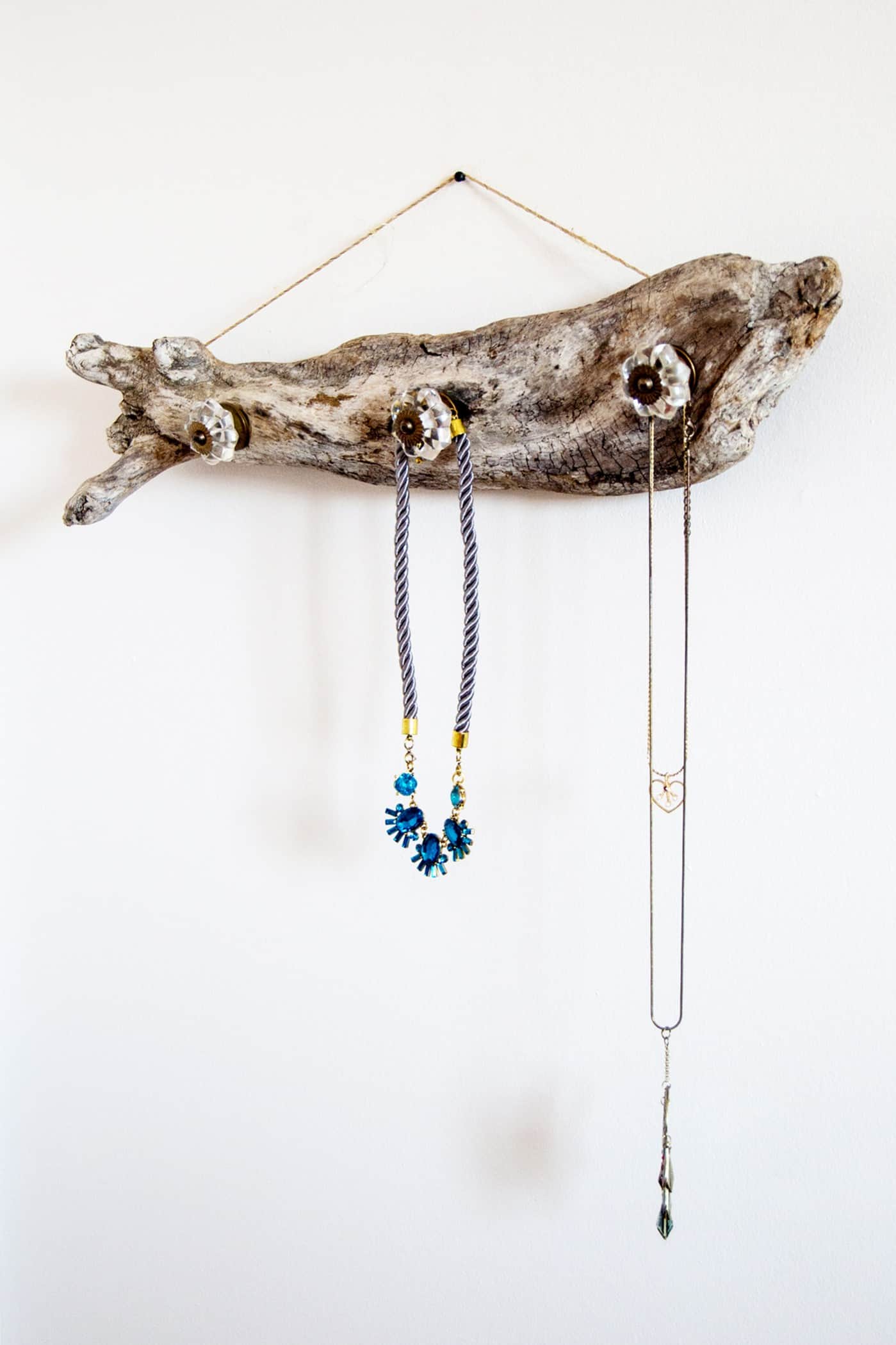 Hanging driftwood jewelry organizer