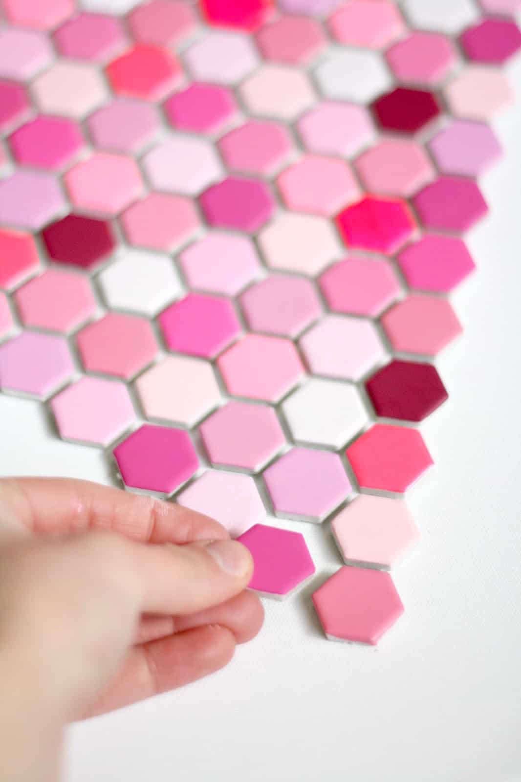 Assembling hexagon tiles into a heart shape
