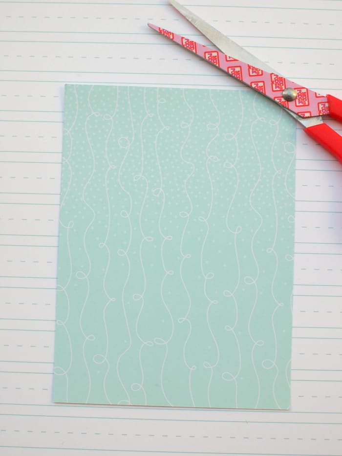 Piece of cardstock cut into a card with scissors