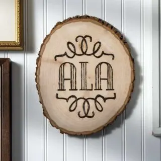 wood burning monogram on a plaque