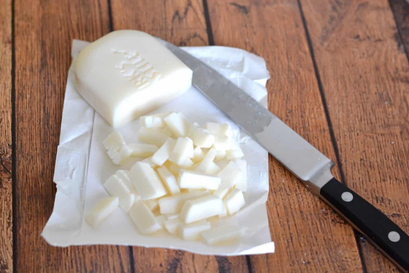 Bar of castile soap cut into pieces with a knife