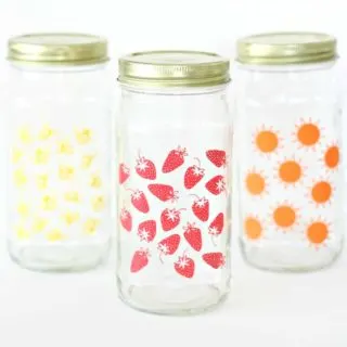 Follow this simple tutorial to upcycle a glass jar you have hanging out in your pantry. This summer craft is perfect for parties and picnics!