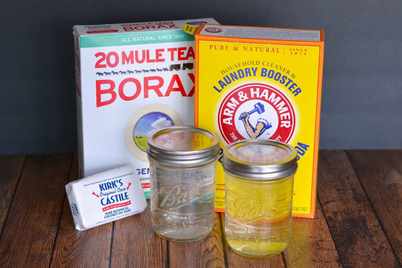 20 Mule team borax, laundry booster, Kirk's castile soap, and liquid laundry detergent in mason jars