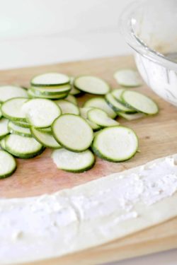zucchini sliced and dough rolled out with cream cheese