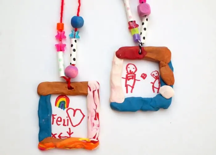 Kids drawing necklaces made with polymer clay