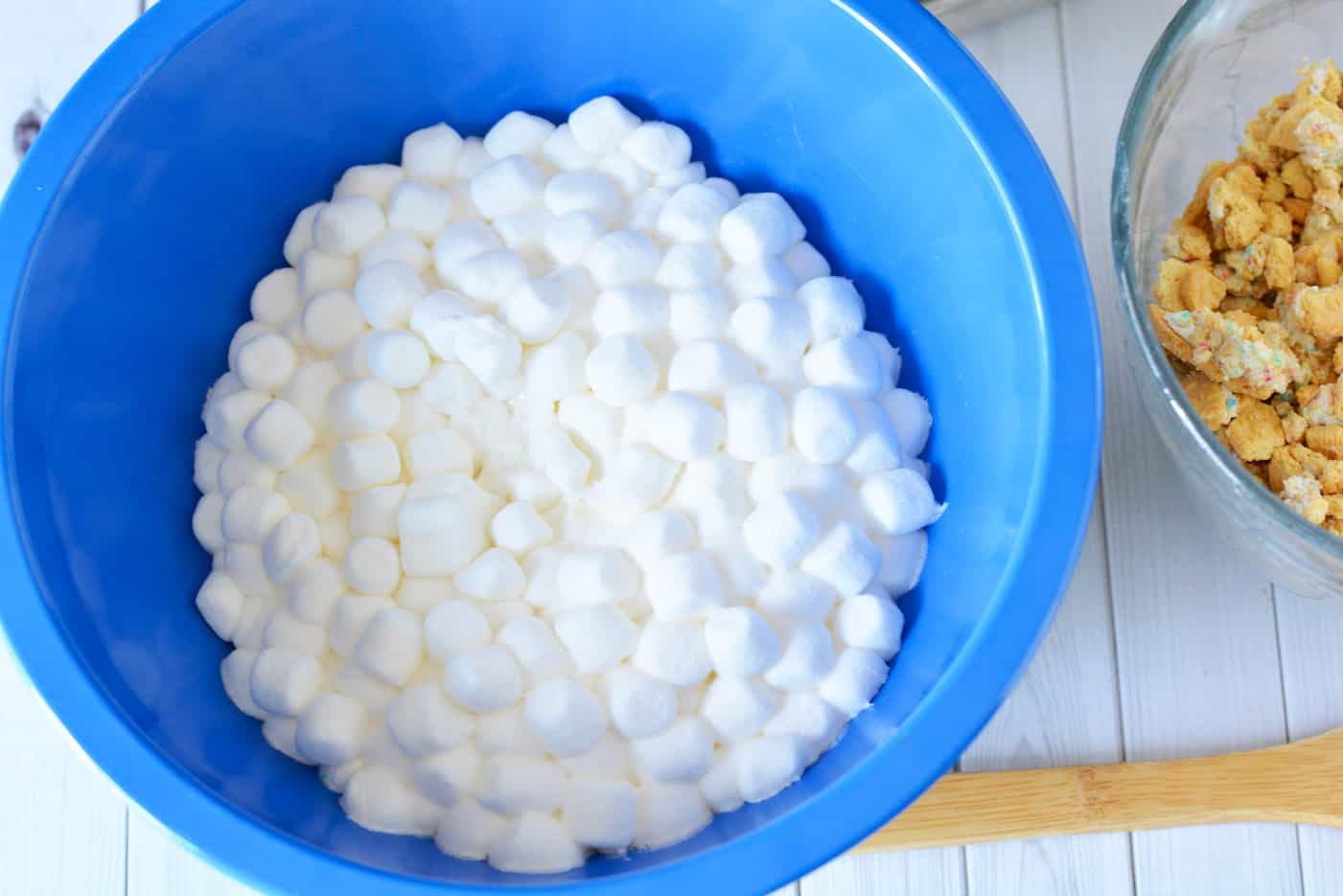 melted marshmallows in a blue bowl