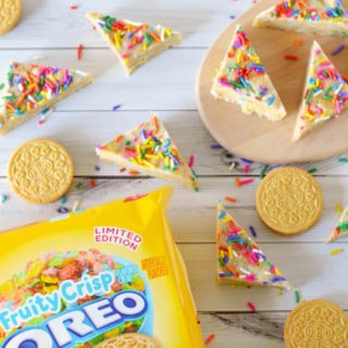 This Oreo dessert features delicious cereal bits that taste just like Fruity Pebbles! Easy to make because it's no bake - your kids will love these.