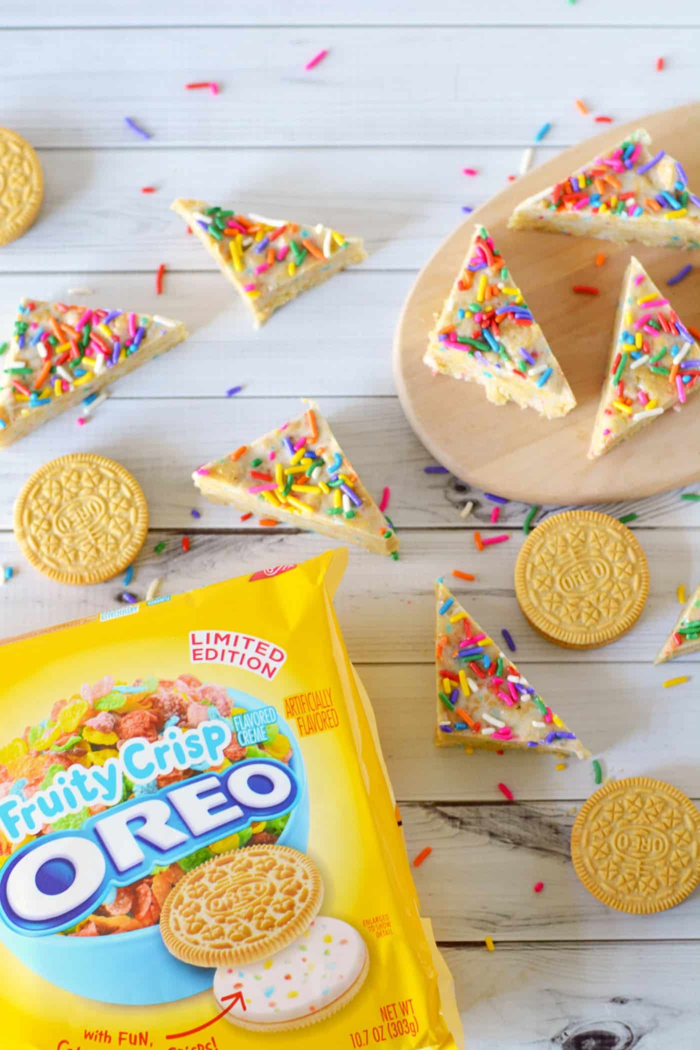 This Oreo dessert features delicious cereal bits that taste just like Fruity Pebbles! Easy to make because it's no bake - your kids will love these.