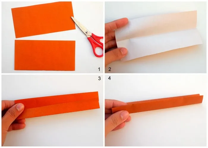 Fold a sheet of origami paper in half
