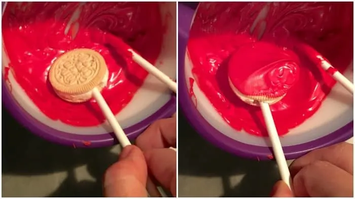 Dipping Golden Oreos into red candy melts