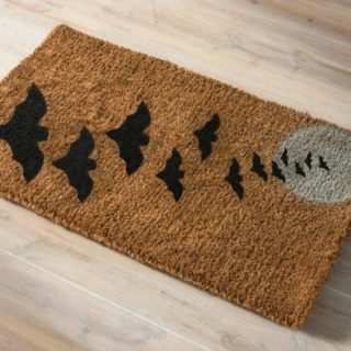 Welcome mats are so fun for the holidays! Make a simple and fun DIY Halloween doormat for your home with spray paint. Templates provided.