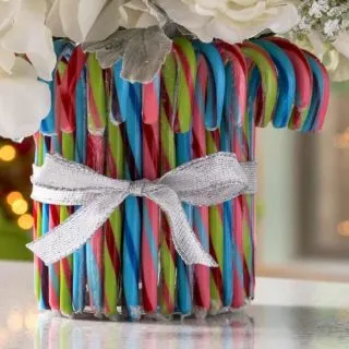 Close up of a candy cane Christmas vase