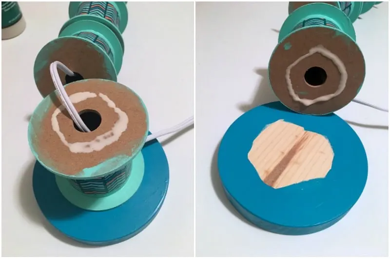 Gluing together ribbon spools on the wood plaque base