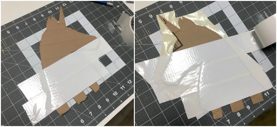 Covering the cardboard unicorn head with white Duck Tape