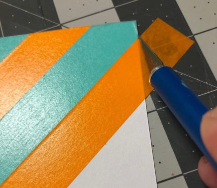 Trim around the edges of washi tape cardstock