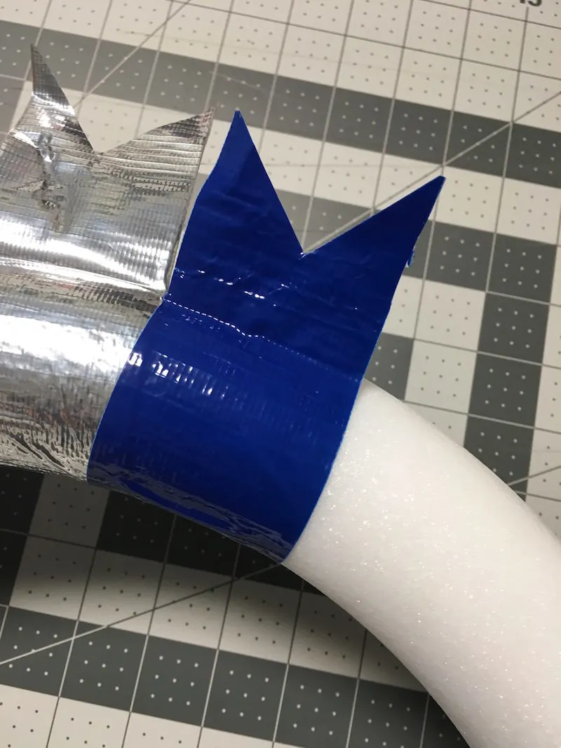 V cut into the end of the blue duck tape