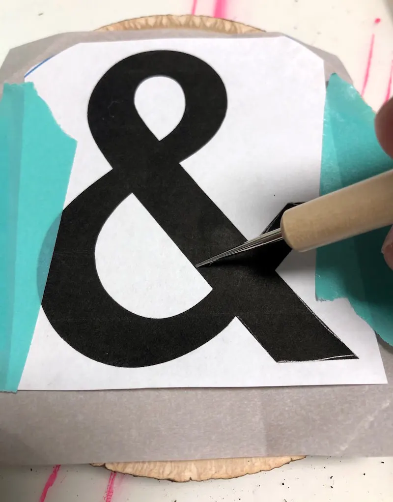 Using a stylus to trace an ampersand