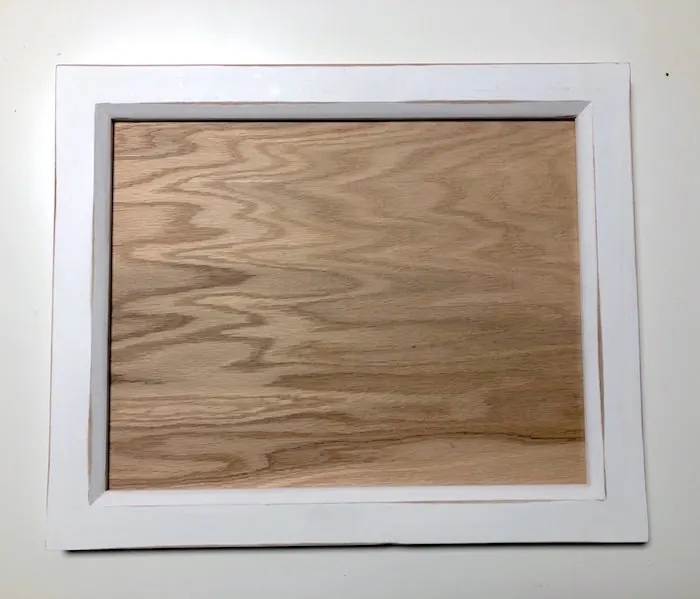 Cut wood to fit in a frame