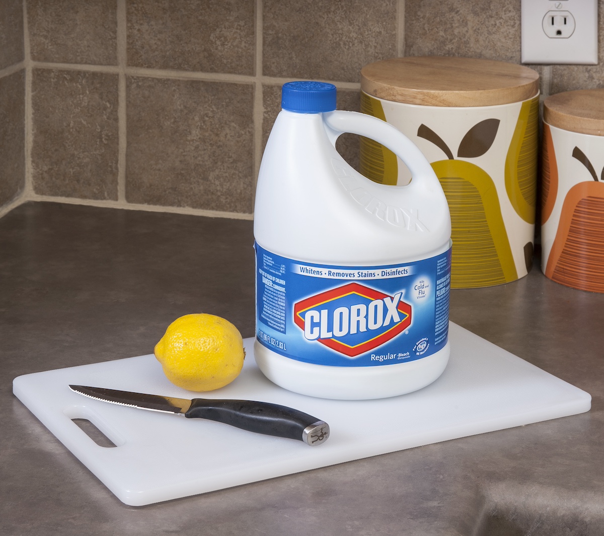 Cleaning cutting board with lemon and bleach
