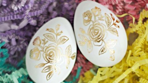 Easter eggs with tattoos on paper shreds